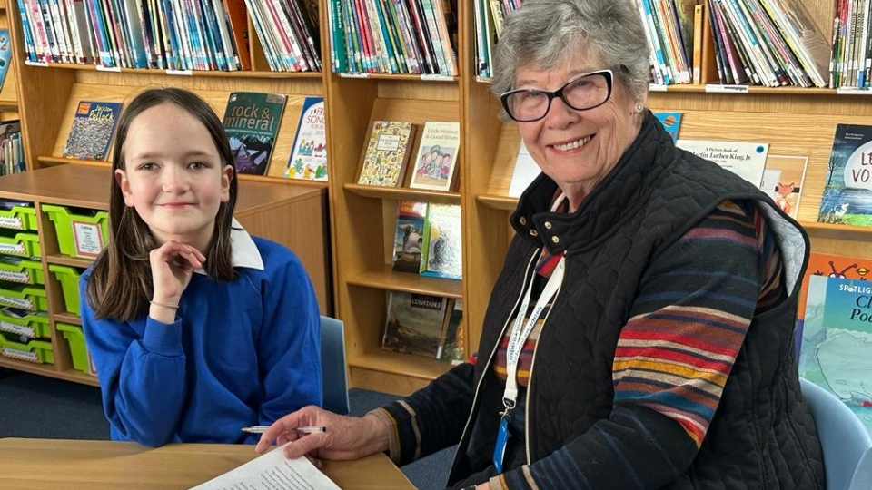 Schoolreaders recruits volunteers to listen to children read in primary schools, focusing on schools where children require the most support