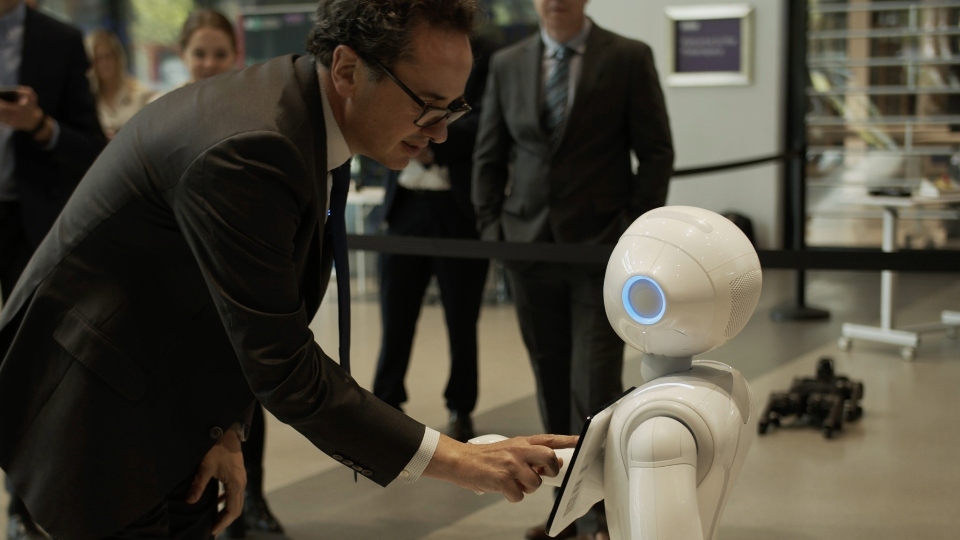 Viscount Camrose, Minister for AI and Intellectual Property, meets humanoid robot Pepper at the Manchester University Engineering Building. Images courtesy of DSIT Viscount Camrose, Minister for AI and Intellectual Property, meets humanoid robot Pepper at the Manchester University Engineering Building. Images courtesy of DSIT