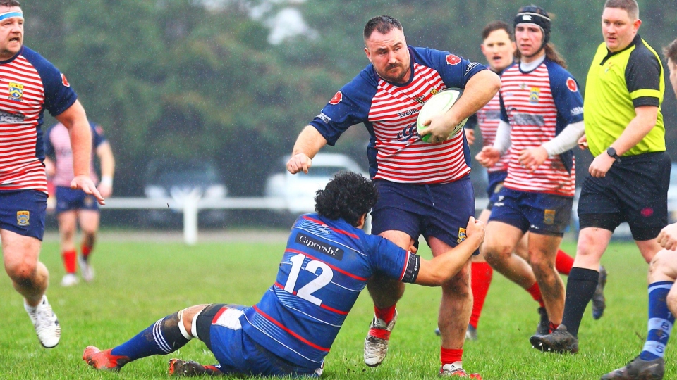 Oldham's Stuart Brennan makes a rare break