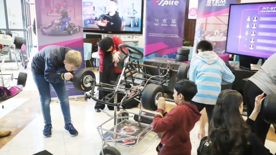 Students testing their speed in the pitstop challenge Students testing their speed in the pitstop challenge