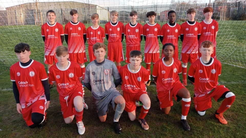 Chadderton Football Club's under-15s squad show off their new strip