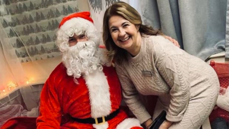 Owner/Nursery Director Jane is pictured with Santa