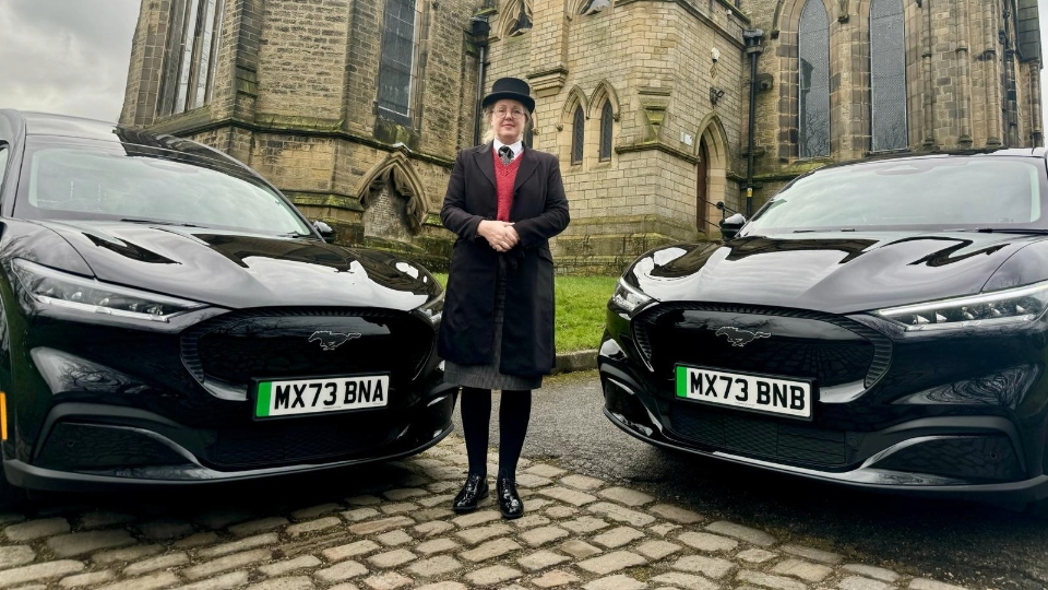 Pauline Lawrence from Elizabeth Way and Company Funeral Directors with the new electric vehicles