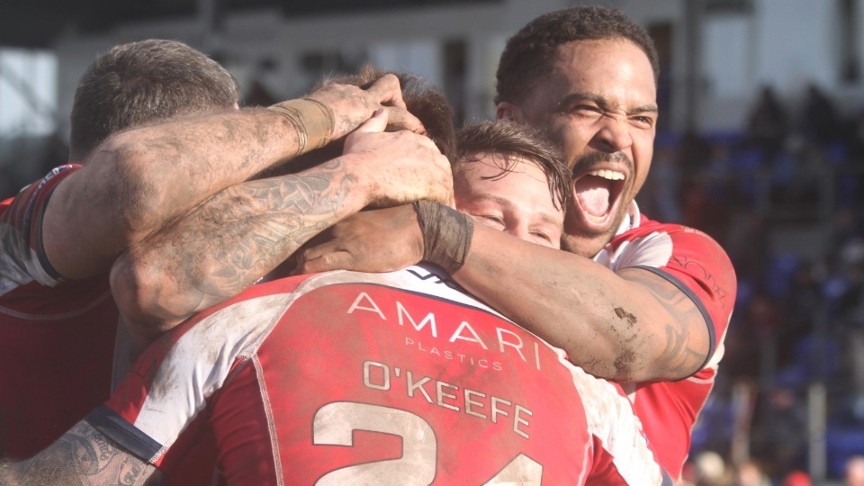 Jordan Turner celebrates an Oldham try. Image courtesy of David Murgatroyd (ORLFC)