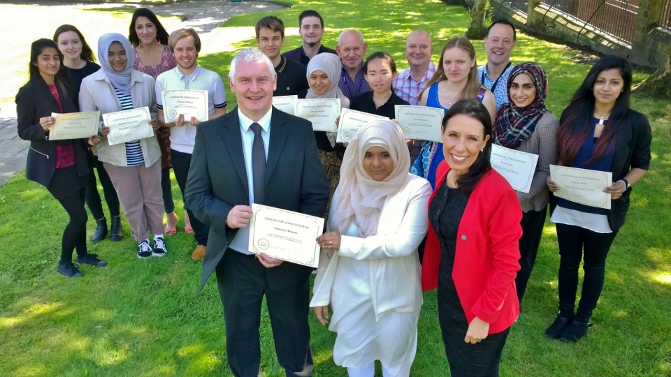 MP Debbie Abrahams pictured with Bryn Hughes, founder of the PC Nicola Hughes Memorial Fund, and Summer Schools students at their graduation day