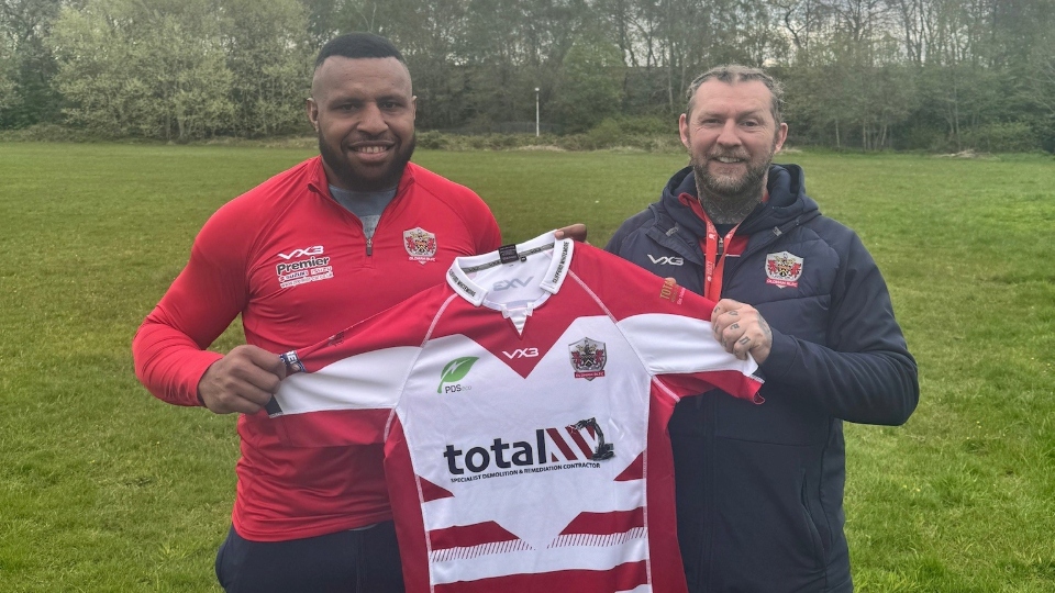 New signing McKenzie Yei is pictured with Sean Long New signing McKenzie Yei is pictured with Sean Long