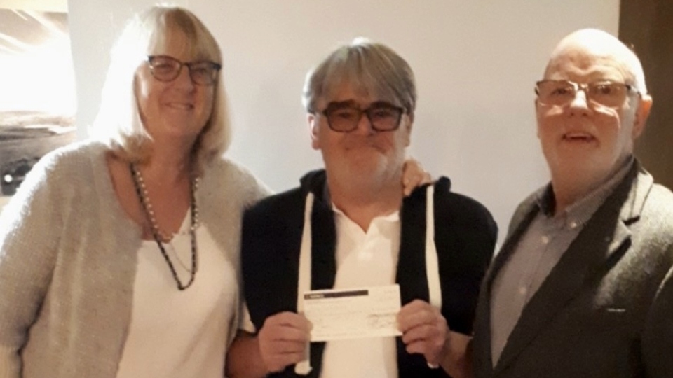 Pictured: Saddleworth Rotary Club President Jon Stocker presenting a cheque for £1,500.to Gayle and Paul Woods of Gap Kenya Pictured: Saddleworth Rotary Club President Jon Stocker presenting a cheque for £1,500.to Gayle and Paul Woods of Gap Kenya
