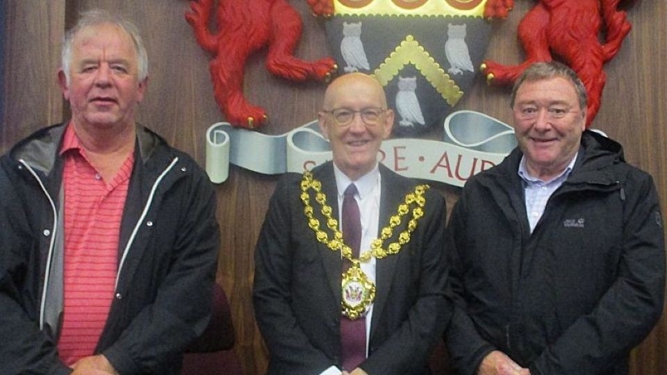 Alan Burke and Steve Rigby flank the Mayor of Oldham, Councillor Eddie Moores
