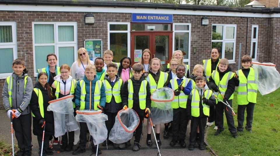 Pupils and staff at St Hugh's CofE Primary School with Jenny Eastwood and Joanne Turner from Calm Ahead CIC and Ghazalla Iqbal from FCHO