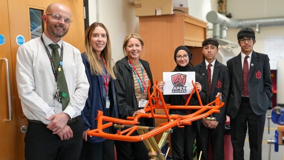 Some of the team with Mr Brown, Katie Wainwright, HR Business Partner at Diodes and Katie Greenwood, Learning and Development Manager at Diodes