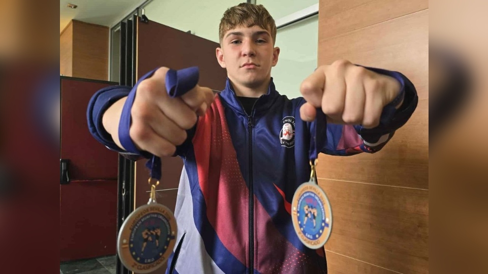 Jacob Cartwright pictured with his medals