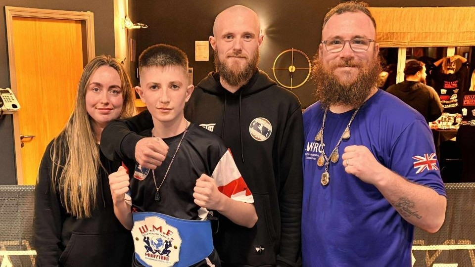 Pictured (from left to right) are Shaunna, champ Theo, Alex and Brad