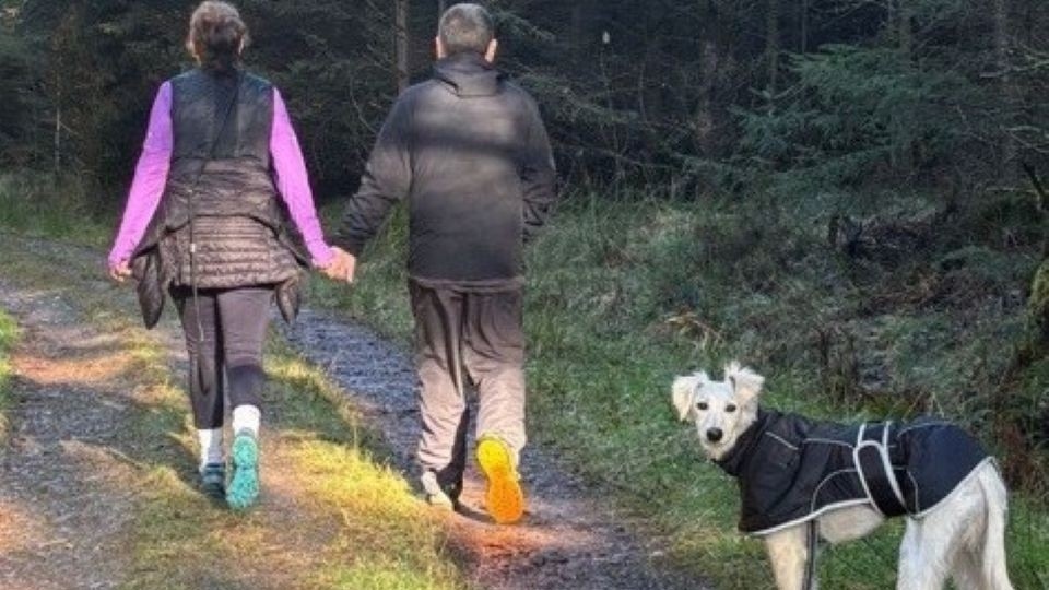 Simon and his partner walking Rodney