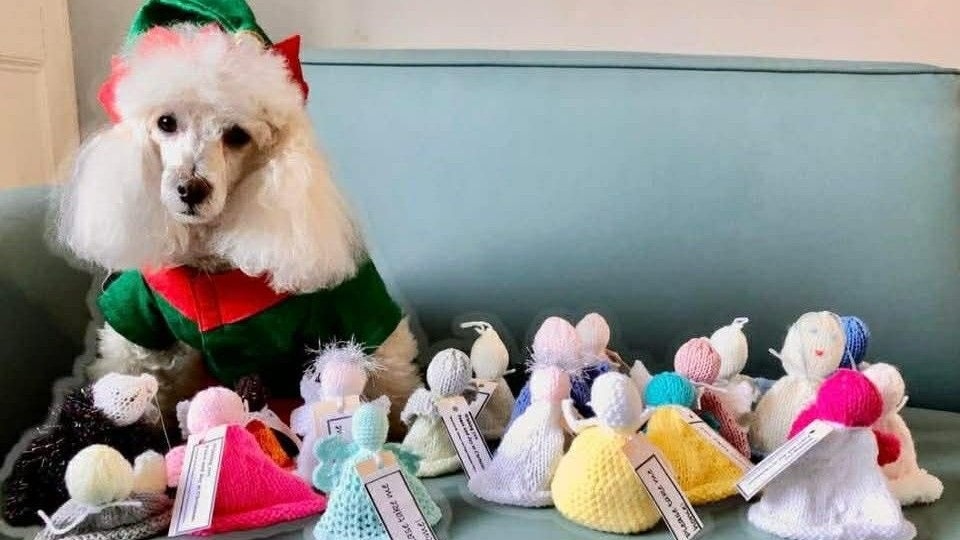 Prior to distribution, each Angel is labelled with a Christmas greeting from the two Churches in Delph