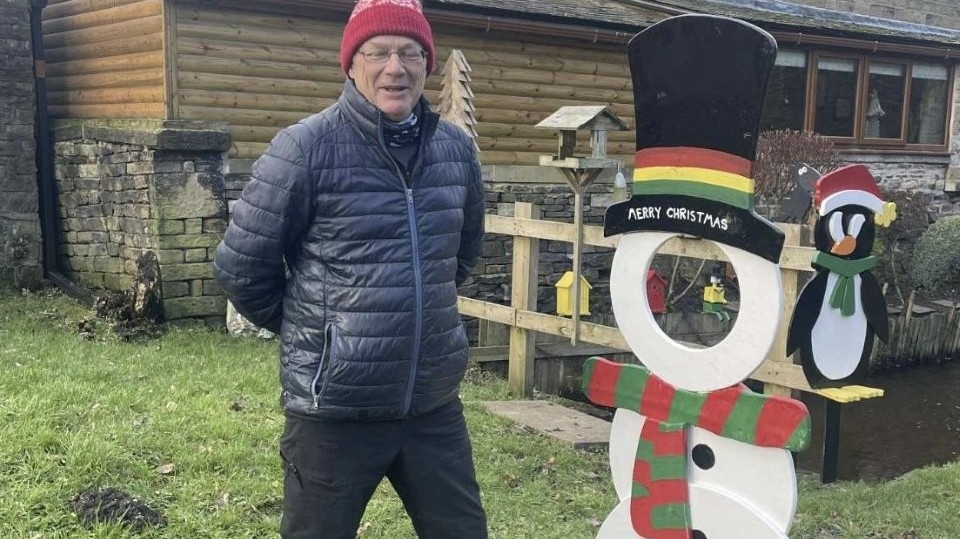 Christopher Bannatyne pictured with his hand-built, rebuilt, Christmas tree