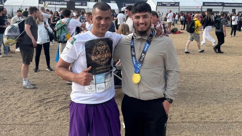 Pictured (left) is Mofozul Miah after completing the London Marathon Pictured (left) is Mofozul Miah after completing the London Marathon