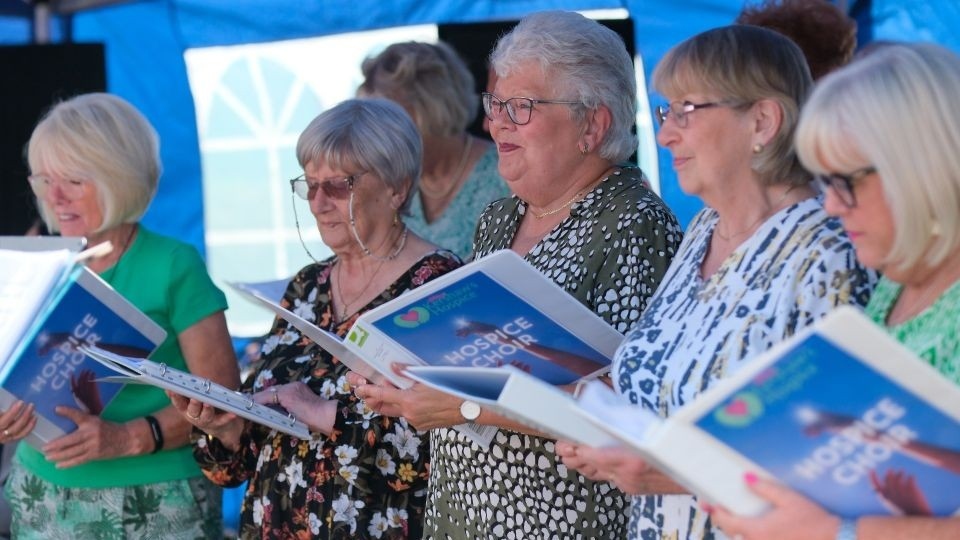 The Dr Kershaw's Choir performing at Rose to Remember. The Dr Kershaw's Choir performing at Rose to Remember.