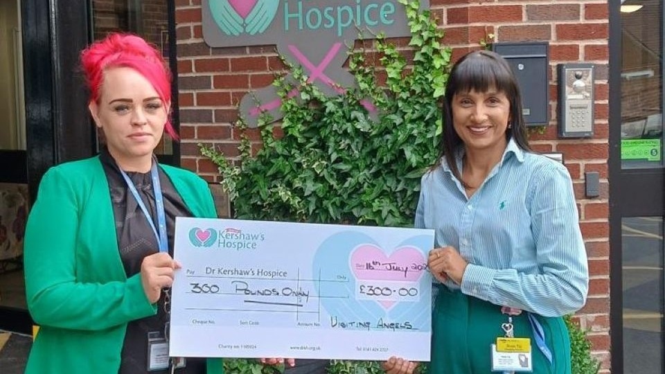 Visiting Angels Manchester East honours two cherished clients by giving back to the hospice that supported their final days. Pictured are Roxie Taj (right, Managing Director) and Jodie Harthan (Care Coordinator) Visiting Angels Manchester East honours two cherished clients by giving back to the hospice that supported their final days. Pictured are Roxie Taj (right, Managing Director) and Jodie Harthan (Care Coordinator)