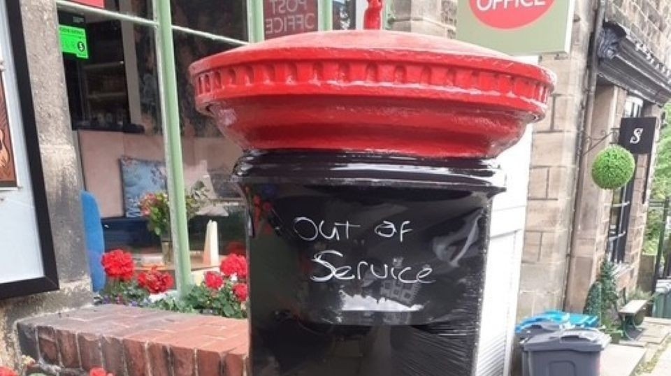 The letter box at the Dobcross Village Store and Post Office The letter box at the Dobcross Village Store and Post Office
