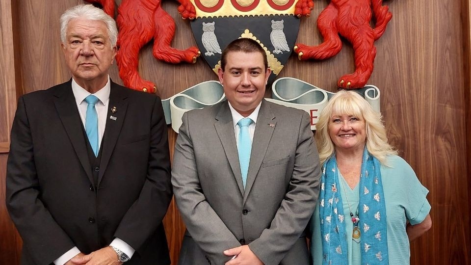 Reform UK's Royton North councillor Lewis Quigg is flanked by Independent councillors Mark Wilkinson and Sandra Hall, both of whom represent Failsworth West