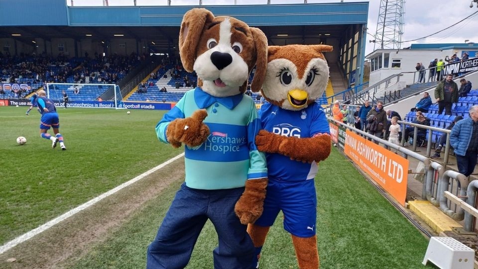 Hartley the dog and Chaddy the owl are pictured at Latics