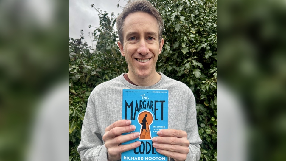 Former Oldham Chronicle journalist Richard Hooton shows off his crime novel 'The Margaret Code'