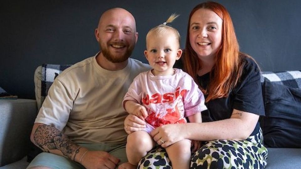 Ben Devall, his daughter, Etta (2) and wife Poppy, pictured at their home in Oldham