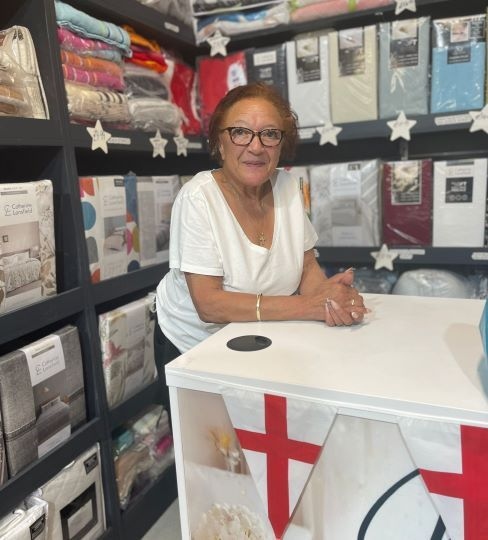 Mary Eleftheriou welcomes customers to her new Oldham Market home