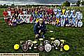 COACH Steve Grice with his teams of Angels and their trophies