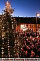 GOOD turn-out . . . hundreds gathered to enjoy the spectacular tree in Uppermill 