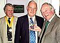 ALL yours . . . Peter Mallinson (right) hands over the presidential chain to Stan Bowes (centre) while Rob Knotts, president-elect, looks on 