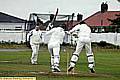 MILNROW’S Mark Fraser is bowled by Oldham’s Stuart Moore in Saturday’s match between the clubs. 