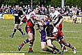 GATESHEAD’S Neil Thorman is caught in an Oldham sandwich. 