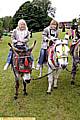 SADDLE up . . . Grace (5) and Hollie (6) Appleby have a donkey ride 