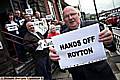 Protest outside Royton Town Hall about the merger with Shaw. Cllr Bernard Judge (front) with members of the public and fellow councillors. 
