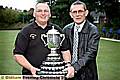 Alan Hodson (left) receives trophy from Sports Editor Bob Young 