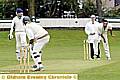 Crompton’s Jevon Searles bowls to Middleton’s Steve Davey.