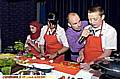 Ready, Steady, Cook at Hathershaw College. Compere Darren Tickler, from organizers Scholarfest pictured with the Red team left to right, Maimoona Khan, Nadiya Begum, Joe Rowan. 