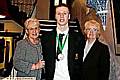 Andrew Martin with his award, and sponsor Sheila Acton, left, of Acton and Acton textile manufacturers, and Maureen Cooper, chairman of Rochdale Childer. 