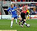 Chris Taylor (left) took up left back slot