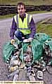 Chris Davies with the litter he collected along the A635 Isle of Skye road 