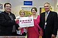 CATCHY logo . . . Maureen Mills (second left) and her winning entry with (from the left) Chris Hamilton and breast surgeons Maria Bramley and Ian McIntosh 