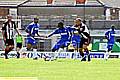 FORMER Grimsby player Jean-Paul Kalala shields the ball for Athletic in the friendly at Blundell Park.