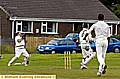 Hollinwood’s Mohammed Kamran has Shaw skipper Rick Harrington caught behind by John McGovern