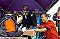 NICHOLA MEGGISON paints Dannielle Allison’s nails while the Mayor of Oldham, Councillor Shoab Akhtar and Mayoress Shafeena Kauser look on 