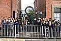 WOW! . . . pictured outside the stunning new gates are Broadfield School pupils with Anne Gilligan from Green Monsters 