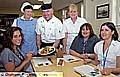 GRUB’S up . . . Jennie Carey prepares to tuck in with (from left) catering assistant Susan Foster, retail chef James Kilbride, restaurant manager Margaret Stafford, hospital chief cashier Julie Owens and Sara Flynn