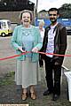 Nellie Bennett (88) one the oldest residents, officially opens the party with postmaster Asam Rashid 