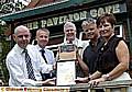 Business partners Mike Cumiskey and Elle Clegg (right), celebrate their cafe’s success with (from the left) parks bosses Glenn Dale and Steve Smith, and Councillor John McCann 
