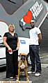 IN fashion . . . RSPCA shops manager Wendy Whiston with Nellie and Tokyo Project manager Philip Edgehill 


